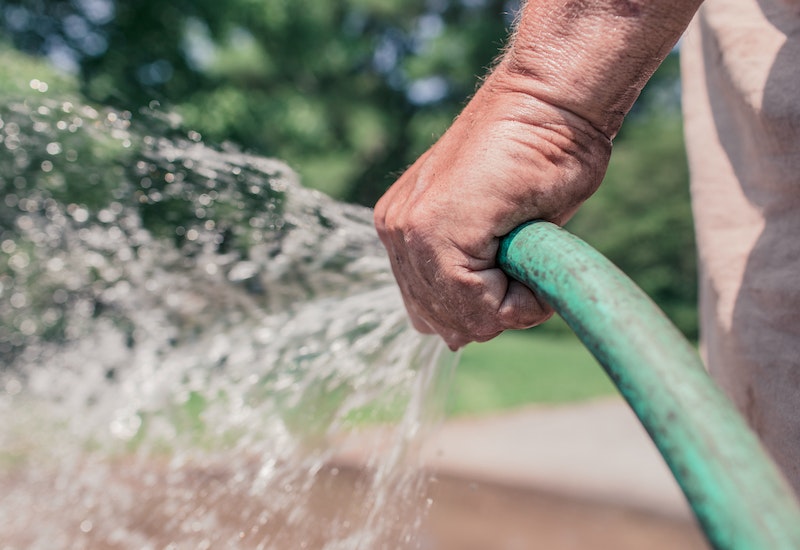 Man Holding water pipe 