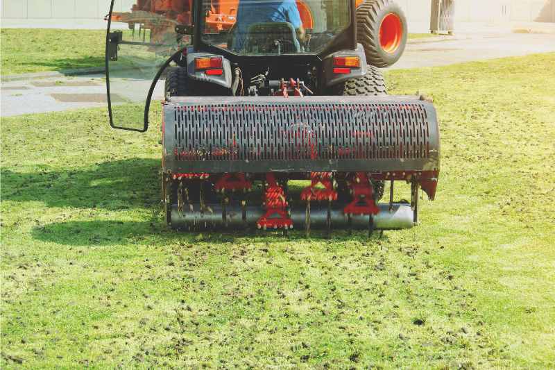 aeration machine on a grass lawn