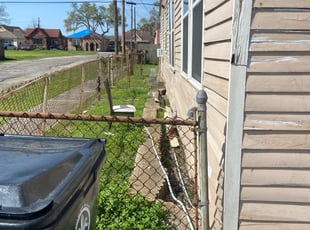 Weeding by Patrick McGuire for Tarik T. in New Orleans, LA