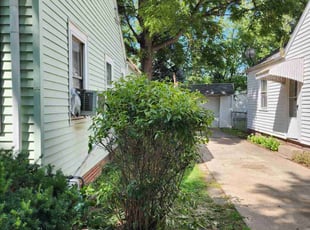 Bush Trimming by Isaac Lagger for Carole S. in Toledo, OH
