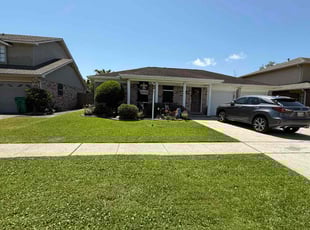 Weeding by Akeem Lewis for William C. in Harvey, LA