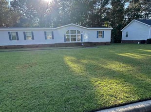 Tia B.'s grass maintenance service result