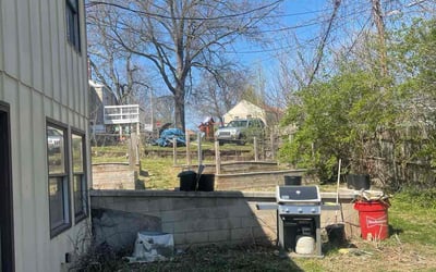 Photo of Megan M.'s yard after getting landscaping in Richmond, MO