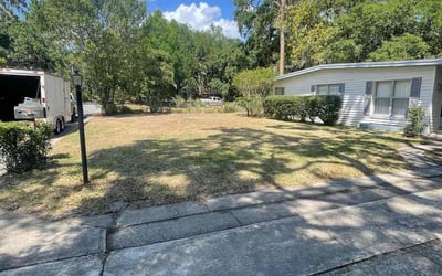 Photo of Mary E.'s yard after getting landscaping in Saint Cloud, FL
