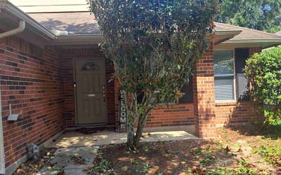 Photo of Brittani E.'s yard after getting lawn care in Dickinson, TX