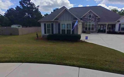 Photo of Keya E.'s yard after getting tree care in Covington, GA