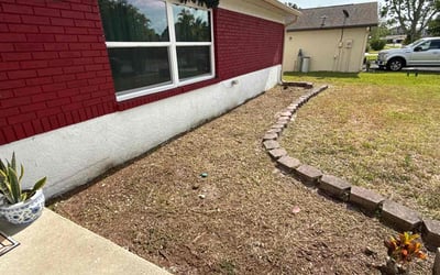 Photo of Christine L.'s yard after getting landscaping in Melbourne, FL
