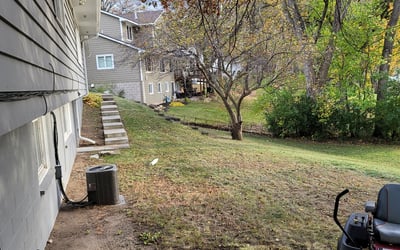 Photo of Kelsey M.'s yard after getting landscaping in Harris, MN