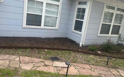 Photo of Debra C.'s yard after getting tree care in Tyler, TX