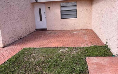 Photo of Renee T.'s yard after getting landscaping in Hallandale, FL