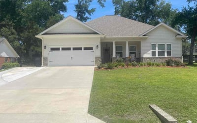 Photo of Gina T.'s yard after getting lawn care in Springtown, TX