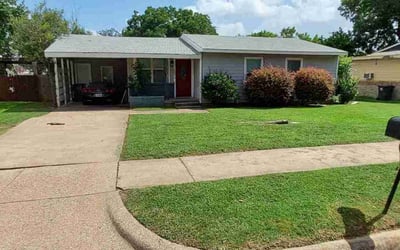 Photo of Dominique C.'s yard after getting lawn care in Arlington, TX
