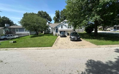 Photo of Angela P.'s yard after getting lawn care in Overland, MO
