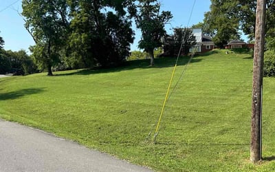Photo of Dusti H.'s yard after getting lawn care in Bon Aqua, TN