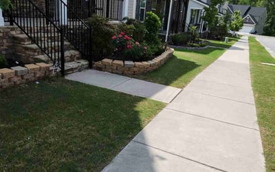 Photo of Natalie B.'s yard after getting lawn care in Powder Springs, GA