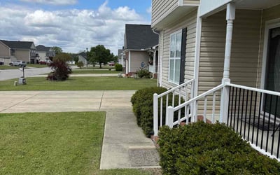 Photo of P.G. R.'s yard after getting lawn care in Lumberton, NC