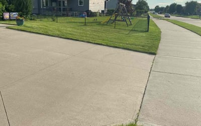 Photo of Paris N.'s yard after getting lawn care in Indianola, IA