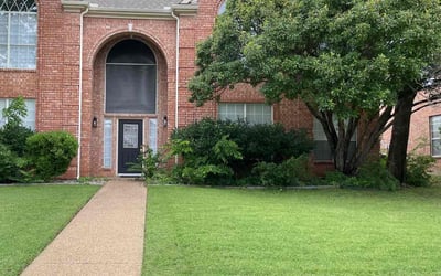 Photo of Tori B.'s yard after getting lawn care in Menasha, WI