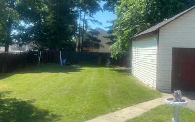 Photo of Gabrielle E.'s yard after getting lawn care in Uniondale, NY