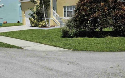 Photo of Tiara J.'s yard after getting lawn care in Pompano Beach, FL