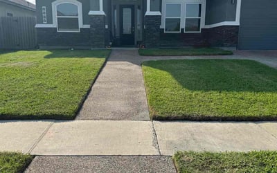 Photo of Mary N.'s yard after getting lawn care in Aransas Pass, TX
