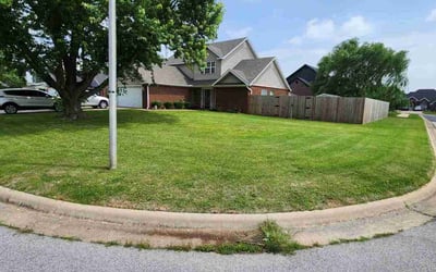 Photo of Chris N.'s yard after getting lawn care in Bentonville, AR