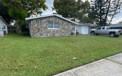 Photo of Shakeena H.'s yard after getting lawn care in Port Richey, FL