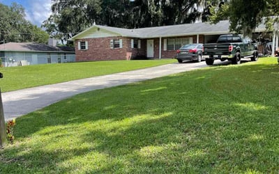 Photo of Jacqueline D.'s yard after getting lawn care in Dover, FL