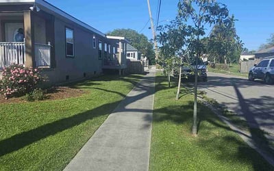 Photo of Aimee S.'s yard after getting lawn care in Pascagoula, MS