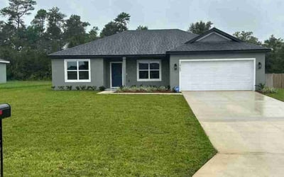 Photo of Glynis D.'s yard after getting lawn care in Summerfield, FL