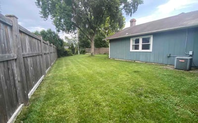 Photo of Mackenzie S.'s yard after getting lawn care in Anniston, AL