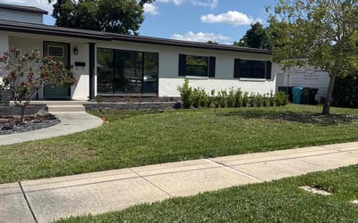 Photo of Christine T.'s yard after getting lawn care in Orlando, FL