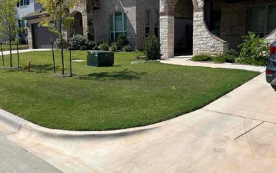 Photo of Jessica A.'s yard after getting lawn care in Benbrook, TX