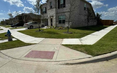 Photo of Lauren C.'s yard after getting lawn care in Royse City, TX