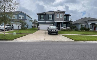 Photo of Jarret L.'s yard after getting lawn care in Orange Park, FL