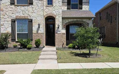 Photo of Libba R.'s yard after getting lawn care in Frisco, TX