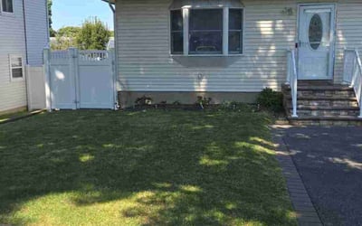 Photo of Adrian W.'s yard after getting lawn care in Farmingville, NY