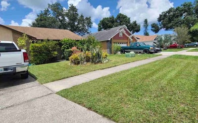 Photo of Karen M.'s yard after getting lawn care in Hunters Creek, FL