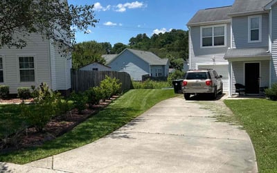 Photo of Ashlynne J.'s yard after getting lawn care in Ada, MI
