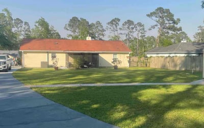Photo of Julissa C.'s yard after getting lawn care in Tallahassee, FL