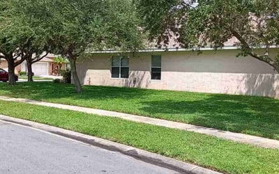 Photo of Diane T.'s yard after getting lawn care in Moline, IL