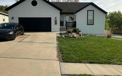 Photo of Dominique M.'s yard after getting lawn care in Paola, KS