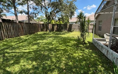Photo of Kim K.'s yard after getting lawn care in Cocoa Beach, FL