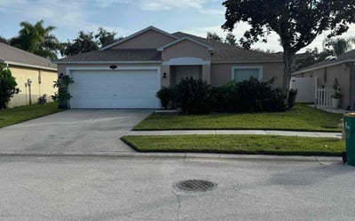 Photo of Deborah K.'s yard after getting lawn care in Melbourne, FL