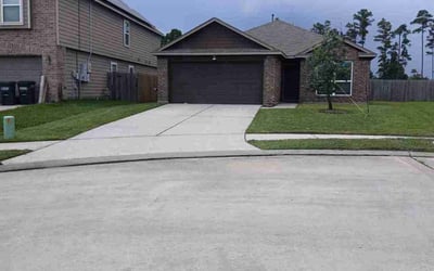 Photo of Christopher J.'s yard after getting lawn care in Montgomery, TX