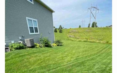 Photo of Mia J.'s yard after getting lawn care in Monticello, MN