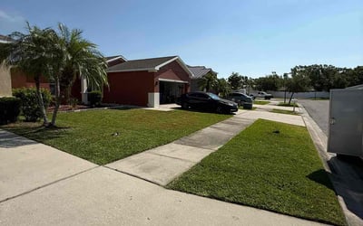 Photo of Juanita T.'s yard after getting lawn care in Melbourne, FL