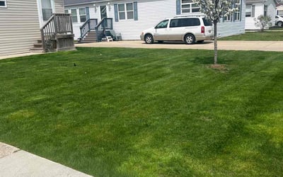 Photo of Kathrine M.'s yard after getting lawn care in Waterford, MI