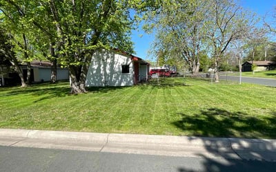 Photo of Andrea T.'s yard after getting lawn care in Anoka, MN