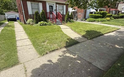 Photo of Kirsten M.'s yard after getting lawn care in West Des Moines, IA